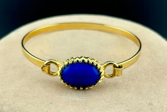 Vintage Gold-Tone Avon Hinged Bracelet Blue Cabochon